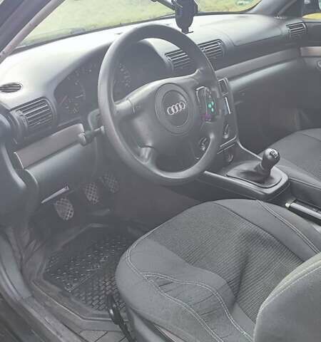 Синий Ауди А4, объемом двигателя 1.6 л и пробегом 325 тыс. км за 3500 $, фото 1 на Automoto.ua