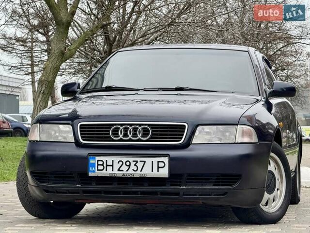 Синий Ауди А4, объемом двигателя 1.8 л и пробегом 321 тыс. км за 3400 $, фото 12 на Automoto.ua