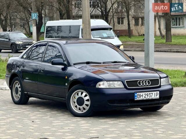 Синий Ауди А4, объемом двигателя 1.8 л и пробегом 321 тыс. км за 3400 $, фото 22 на Automoto.ua