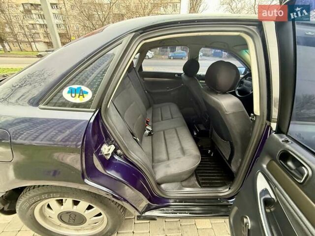 Синий Ауди А4, объемом двигателя 1.8 л и пробегом 321 тыс. км за 3400 $, фото 54 на Automoto.ua