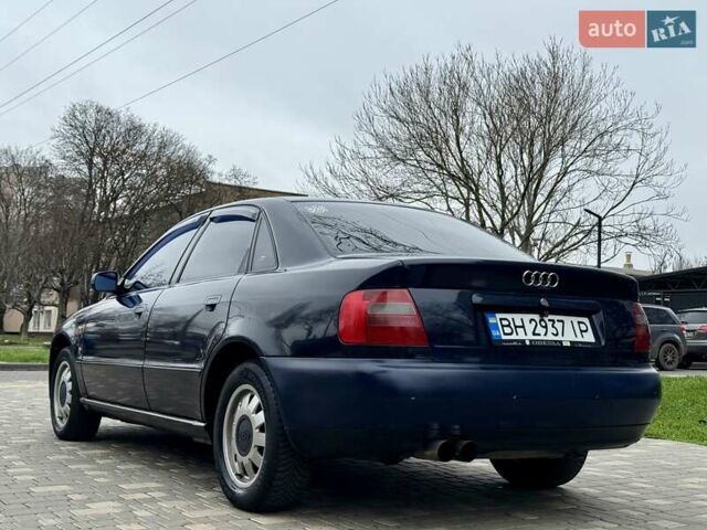 Синий Ауди А4, объемом двигателя 1.8 л и пробегом 321 тыс. км за 3400 $, фото 10 на Automoto.ua