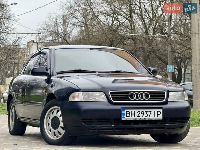 Синий Ауди А4, объемом двигателя 1.8 л и пробегом 321 тыс. км за 3400 $, фото 24 на Automoto.ua