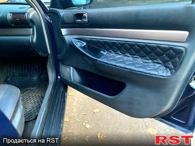 Синий Ауди А4, объемом двигателя 1.6 л и пробегом 240 тыс. км за 2650 $, фото 4 на Automoto.ua