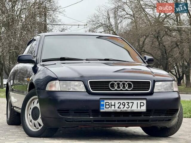 Синий Ауди А4, объемом двигателя 1.8 л и пробегом 321 тыс. км за 3400 $, фото 19 на Automoto.ua