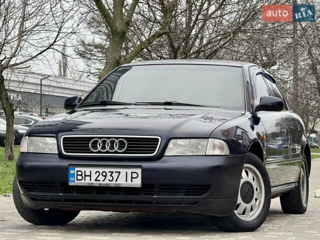 Синий Ауди А4, объемом двигателя 1.8 л и пробегом 321 тыс. км за 3400 $, фото 11 на Automoto.ua