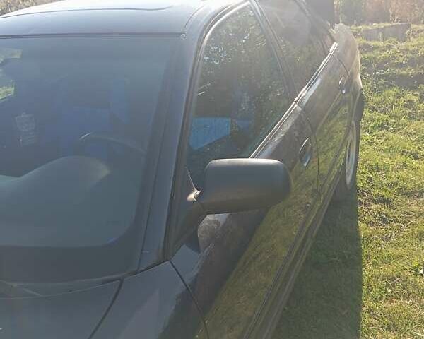 Синій Ауді А4, об'ємом двигуна 1.6 л та пробігом 208 тис. км за 4000 $, фото 10 на Automoto.ua