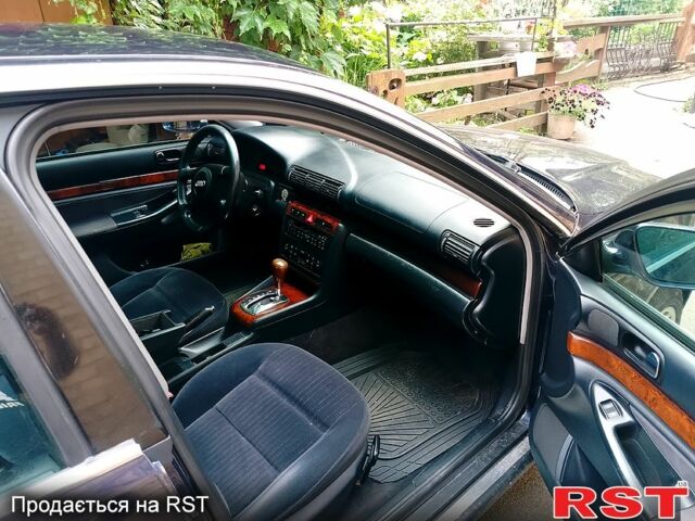 Синий Ауди А4, объемом двигателя 2.4 л и пробегом 347 тыс. км за 2800 $, фото 3 на Automoto.ua