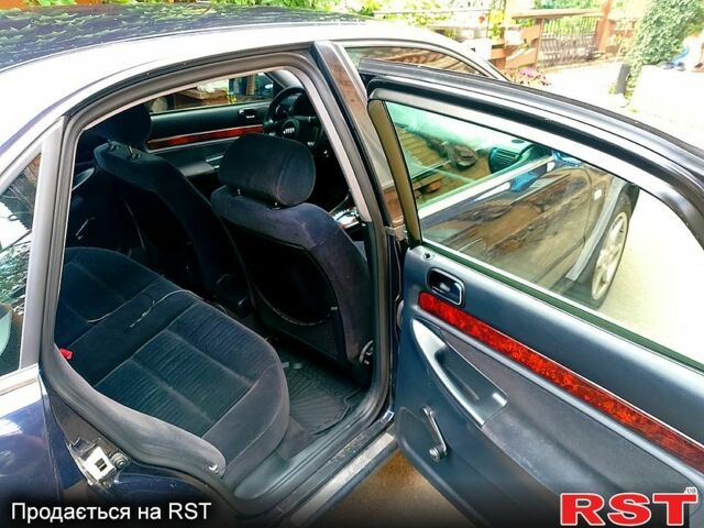 Синий Ауди А4, объемом двигателя 2.4 л и пробегом 323 тыс. км за 3300 $, фото 5 на Automoto.ua