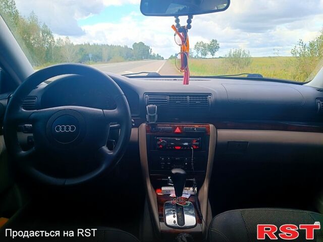 Синій Ауді А4, об'ємом двигуна 1.8 л та пробігом 348 тис. км за 4500 $, фото 8 на Automoto.ua