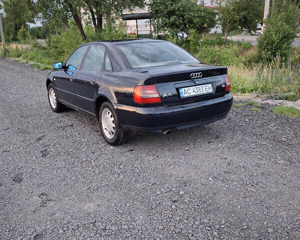 Синий Ауди А4, объемом двигателя 1.6 л и пробегом 218 тыс. км за 3850 $, фото 5 на Automoto.ua