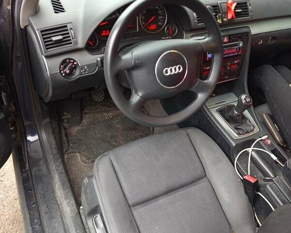 Синий Ауди А4, объемом двигателя 2 л и пробегом 245 тыс. км за 4800 $, фото 4 на Automoto.ua