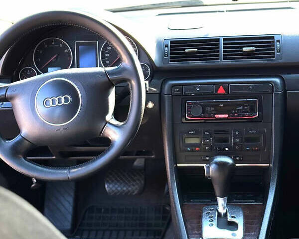 Синій Ауді А4, об'ємом двигуна 1.98 л та пробігом 311 тис. км за 4100 $, фото 5 на Automoto.ua