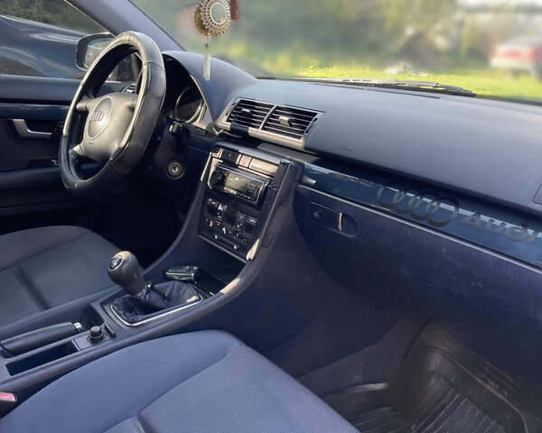 Синий Ауди А4, объемом двигателя 1.6 л и пробегом 209 тыс. км за 3750 $, фото 3 на Automoto.ua