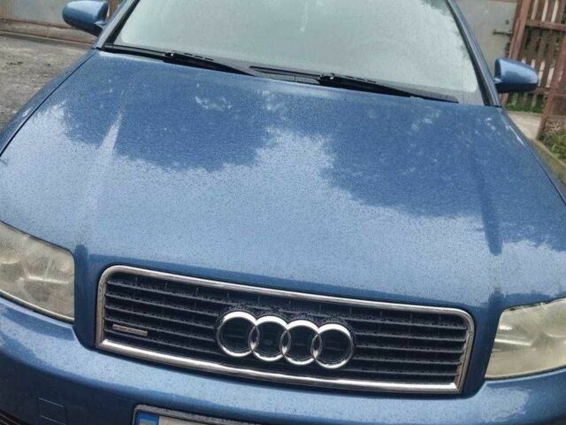 Синий Ауди А4, объемом двигателя 2 л и пробегом 228 тыс. км за 4000 $, фото 2 на Automoto.ua