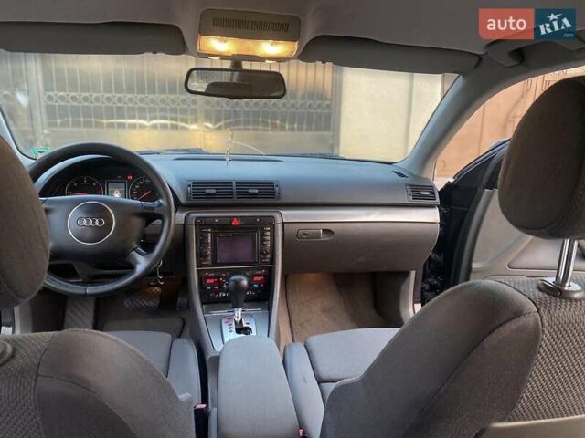 Синий Ауди А4, объемом двигателя 2.5 л и пробегом 322 тыс. км за 5000 $, фото 5 на Automoto.ua
