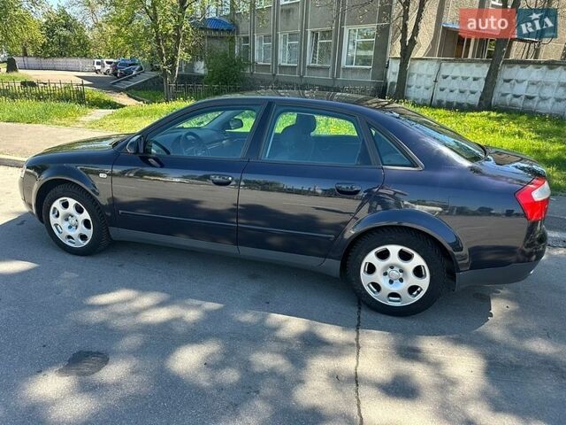 Синий Ауди А4, объемом двигателя 1.6 л и пробегом 237 тыс. км за 4999 $, фото 4 на Automoto.ua