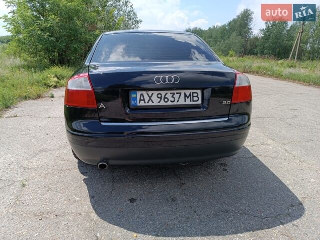 Синий Ауди А4, объемом двигателя 2 л и пробегом 230 тыс. км за 5300 $, фото 1 на Automoto.ua