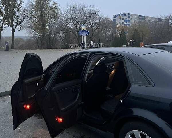 Синій Ауді А4, об'ємом двигуна 1.6 л та пробігом 335 тис. км за 5500 $, фото 4 на Automoto.ua