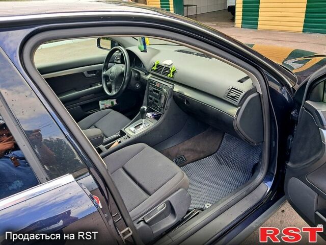 Синий Ауди А4, объемом двигателя 2 л и пробегом 220 тыс. км за 5200 $, фото 4 на Automoto.ua