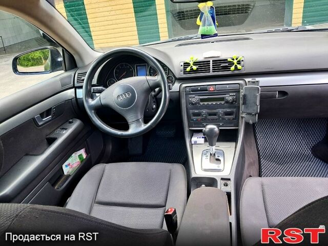 Синий Ауди А4, объемом двигателя 2 л и пробегом 220 тыс. км за 5200 $, фото 3 на Automoto.ua