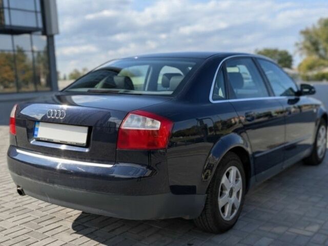 Синій Ауді А4, об'ємом двигуна 1.6 л та пробігом 185 тис. км за 5500 $, фото 3 на Automoto.ua