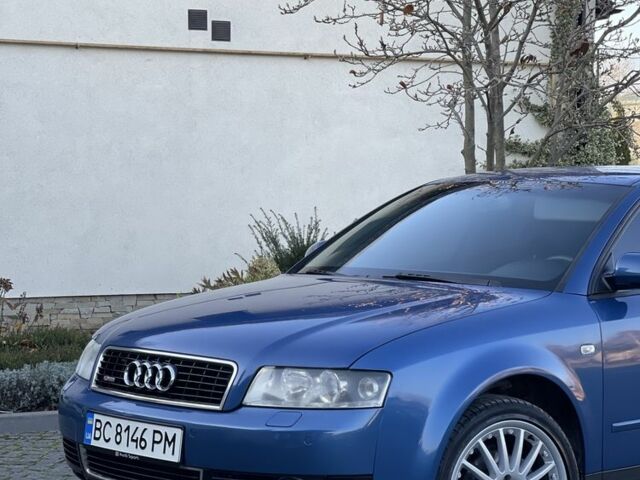 Синий Ауди А4, объемом двигателя 1.6 л и пробегом 258 тыс. км за 4199 $, фото 1 на Automoto.ua
