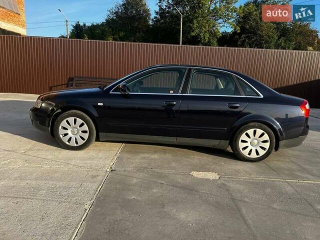 Синій Ауді А4, об'ємом двигуна 1.6 л та пробігом 211 тис. км за 6000 $, фото 3 на Automoto.ua