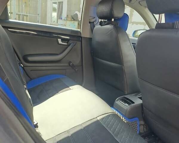 Синий Ауди А4, объемом двигателя 1.8 л и пробегом 238 тыс. км за 5500 $, фото 5 на Automoto.ua