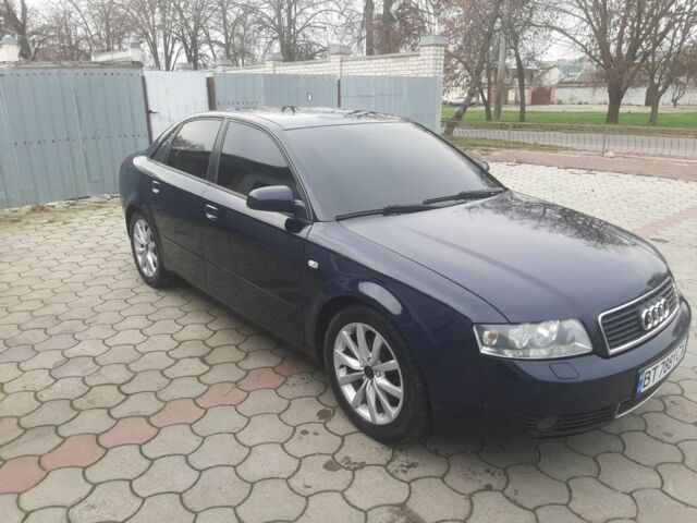 Синий Ауди А4, объемом двигателя 2.5 л и пробегом 314 тыс. км за 6500 $, фото 1 на Automoto.ua