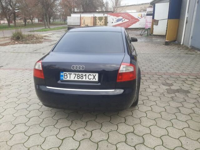 Синий Ауди А4, объемом двигателя 2.5 л и пробегом 314 тыс. км за 6500 $, фото 5 на Automoto.ua