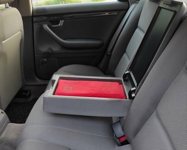 Синий Ауди А4, объемом двигателя 1.6 л и пробегом 181 тыс. км за 6250 $, фото 88 на Automoto.ua