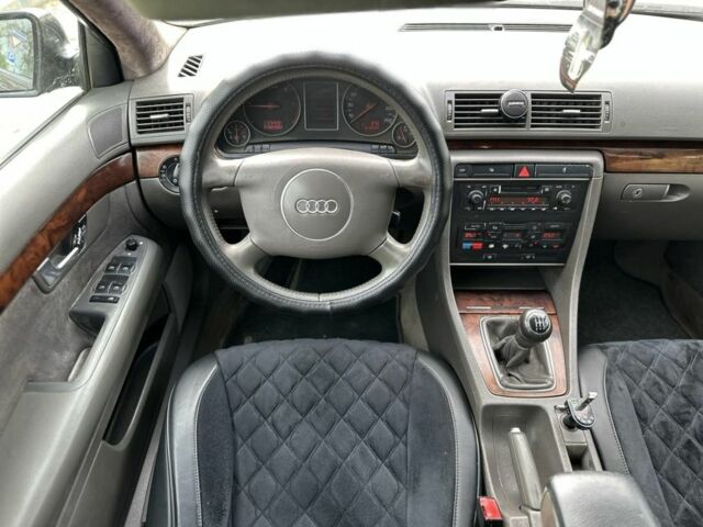 Синий Ауди А4, объемом двигателя 1.9 л и пробегом 299 тыс. км за 1999 $, фото 4 на Automoto.ua