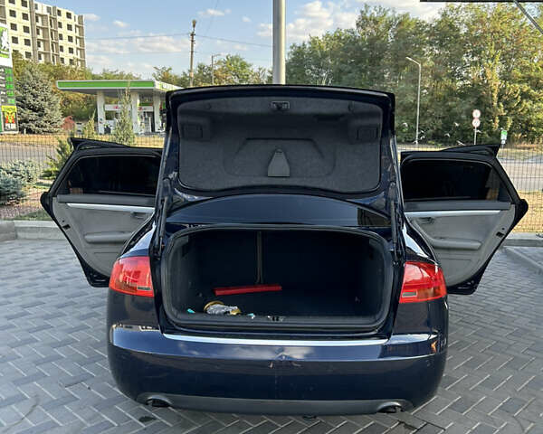 Синий Ауди А4, объемом двигателя 2.5 л и пробегом 303 тыс. км за 6500 $, фото 8 на Automoto.ua