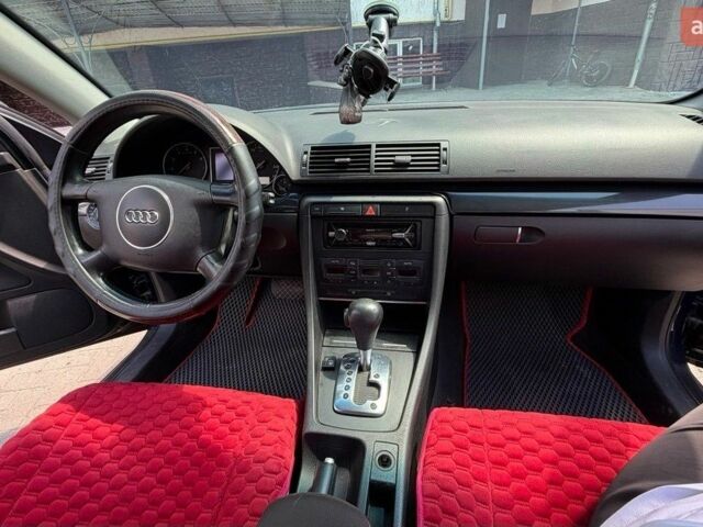 Синій Ауді А4, об'ємом двигуна 2 л та пробігом 255 тис. км за 4000 $, фото 1 на Automoto.ua