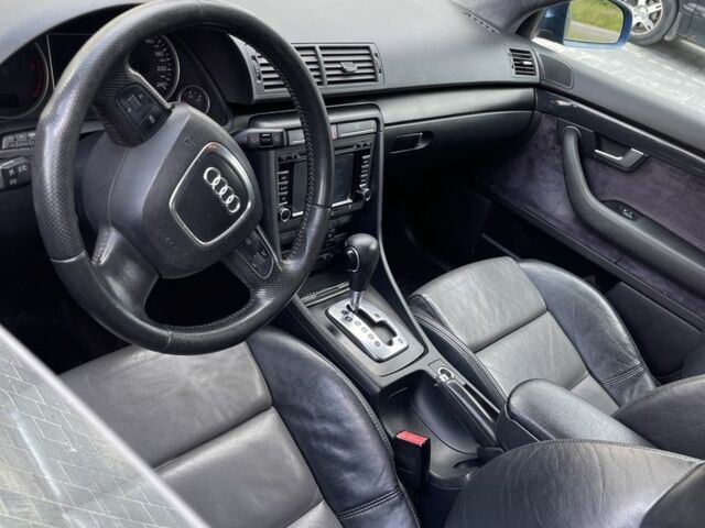 Синий Ауди А4, объемом двигателя 2 л и пробегом 209 тыс. км за 6700 $, фото 3 на Automoto.ua