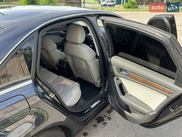Синий Ауди А4, объемом двигателя 2 л и пробегом 174 тыс. км за 14300 $, фото 4 на Automoto.ua