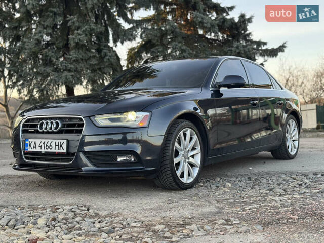 Синий Ауди А4, объемом двигателя 2 л и пробегом 192 тыс. км за 13600 $, фото 1 на Automoto.ua