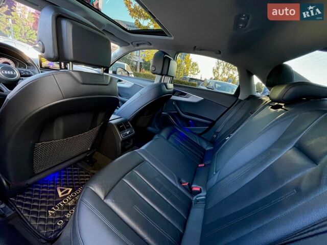 Синий Ауди А4, объемом двигателя 2 л и пробегом 131 тыс. км за 20500 $, фото 57 на Automoto.ua
