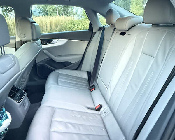 Синий Ауди А4, объемом двигателя 1.98 л и пробегом 126 тыс. км за 21000 $, фото 5 на Automoto.ua