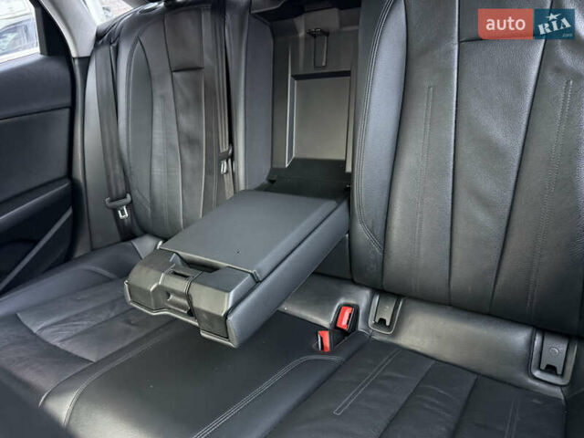 Синий Ауди А4, объемом двигателя 1.98 л и пробегом 251 тыс. км за 14299 $, фото 13 на Automoto.ua