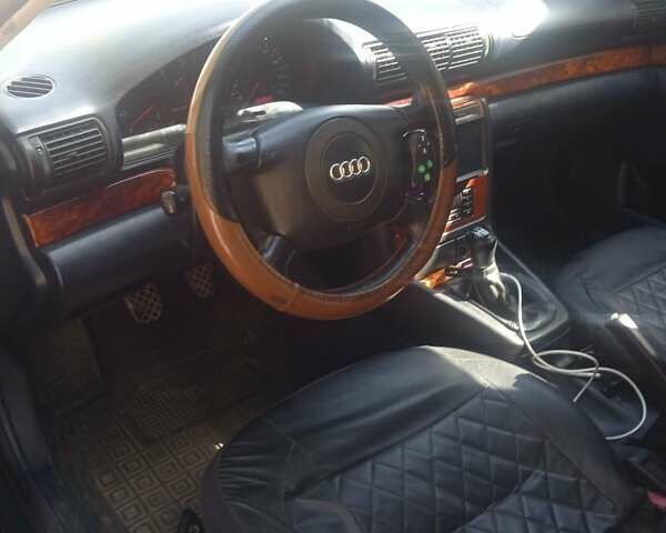 Синій Ауді А4, об'ємом двигуна 1.6 л та пробігом 243 тис. км за 3500 $, фото 2 на Automoto.ua