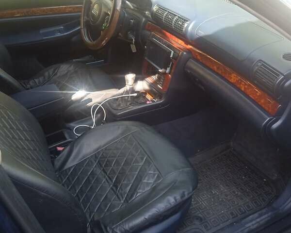 Синій Ауді А4, об'ємом двигуна 1.6 л та пробігом 243 тис. км за 3500 $, фото 1 на Automoto.ua