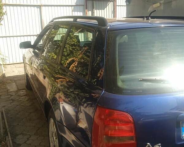 Синій Ауді А4, об'ємом двигуна 1.6 л та пробігом 243 тис. км за 3500 $, фото 6 на Automoto.ua