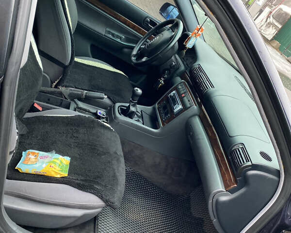 Синий Ауди А4, объемом двигателя 1.8 л и пробегом 250 тыс. км за 3700 $, фото 6 на Automoto.ua