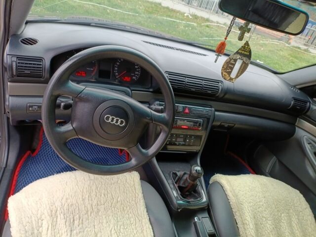 Синий Ауди А4, объемом двигателя 1.6 л и пробегом 337 тыс. км за 4794 $, фото 2 на Automoto.ua