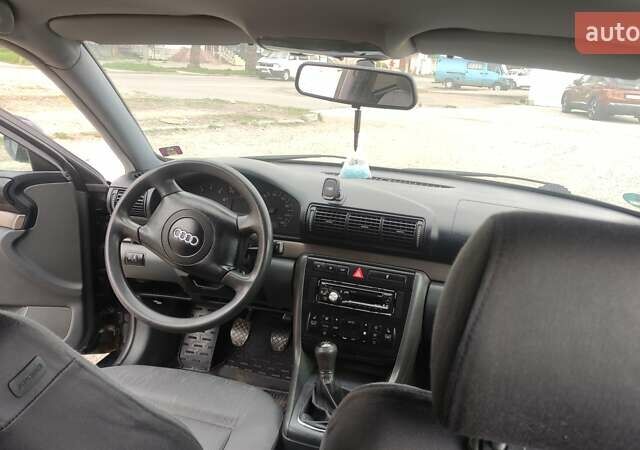 Синий Ауди А4, объемом двигателя 1.6 л и пробегом 268 тыс. км за 3500 $, фото 10 на Automoto.ua