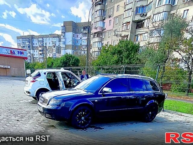 Синий Ауди А4, объемом двигателя 2.5 л и пробегом 398 тыс. км за 6000 $, фото 5 на Automoto.ua