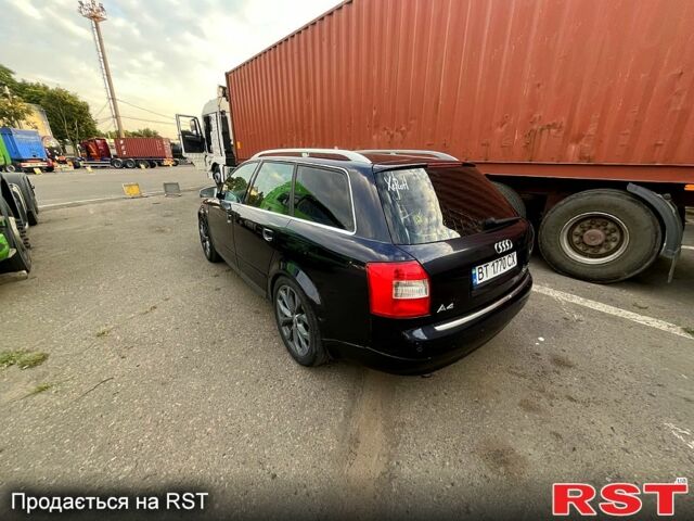 Синий Ауди А4, объемом двигателя 2.5 л и пробегом 398 тыс. км за 6000 $, фото 6 на Automoto.ua