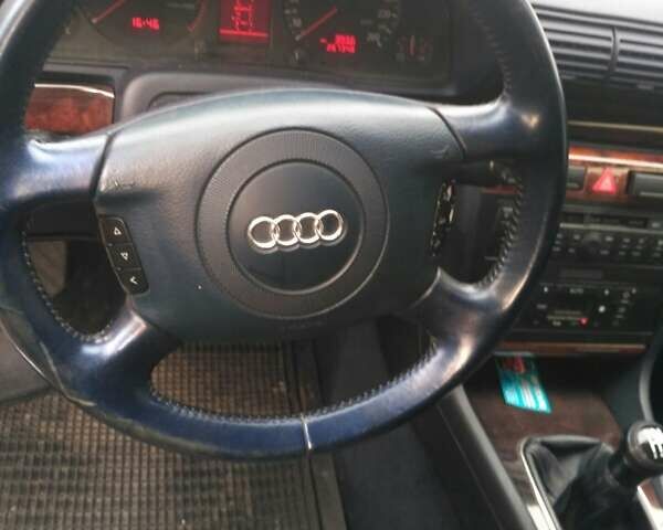 Синий Ауди А4, объемом двигателя 1.8 л и пробегом 267 тыс. км за 3900 $, фото 4 на Automoto.ua