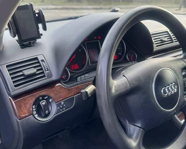 Синий Ауди А4, объемом двигателя 2 л и пробегом 205 тыс. км за 5200 $, фото 6 на Automoto.ua